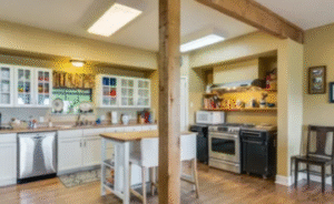 Kitchen with white cabinets glass doors